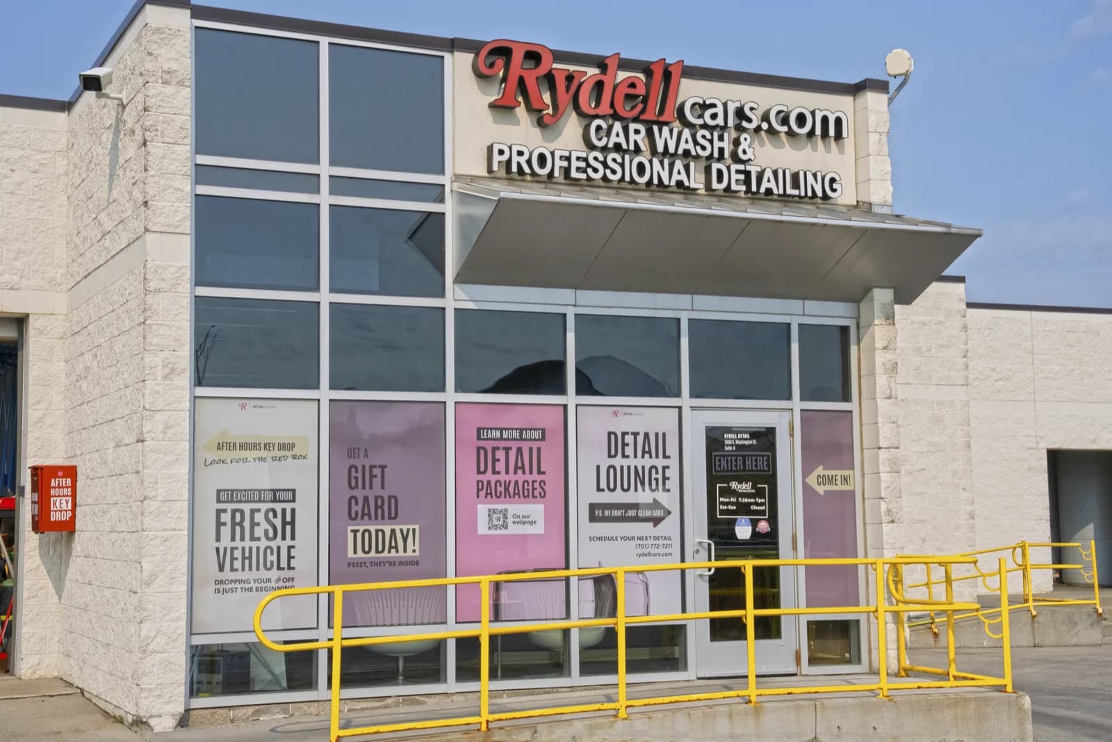 The entrance to the Rydell Detail Center in Grand Forks: a glass storefront under the Rydell Car Wash and Professional Detailing sign, with an "Enter here" door and the after-hours key drop box on the wall.